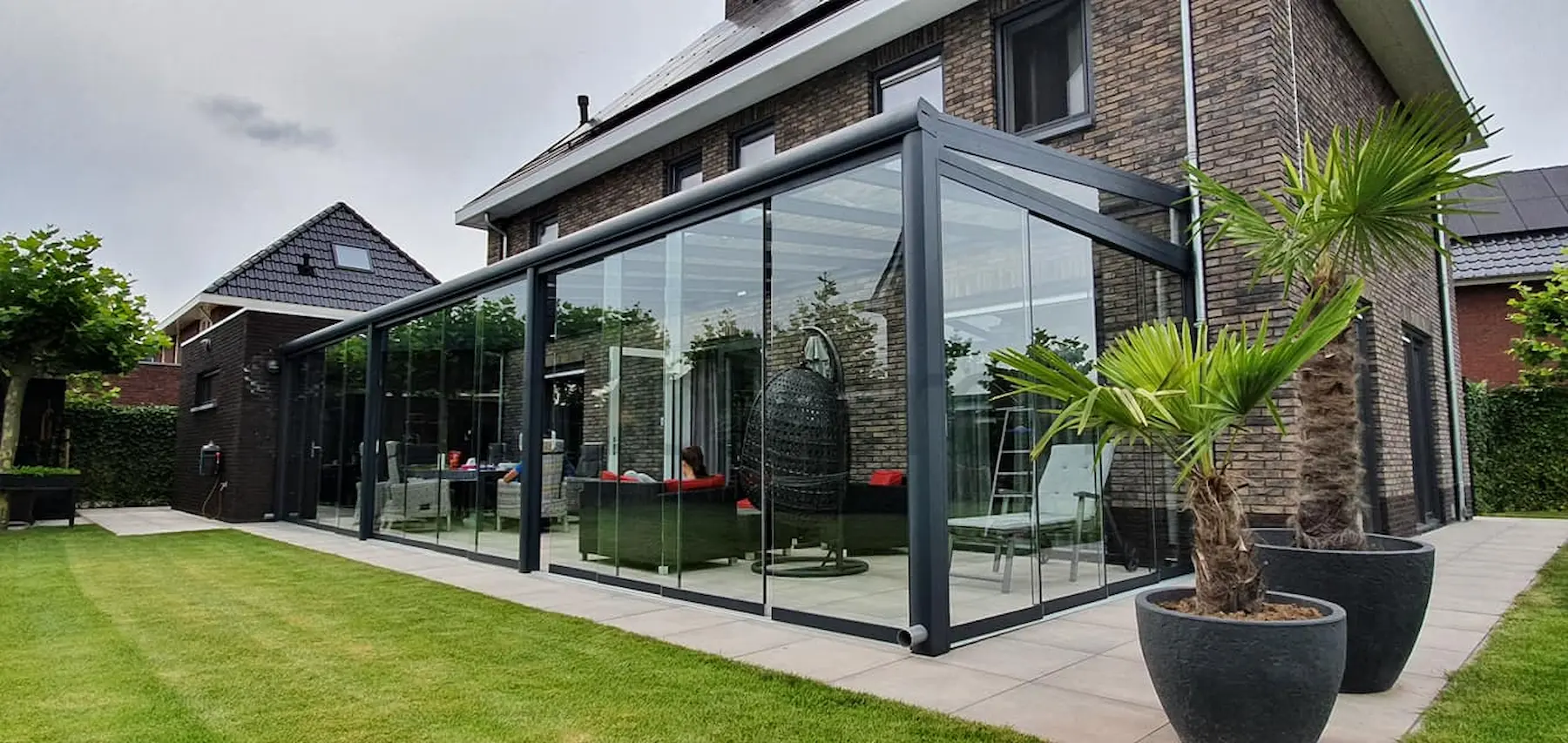 Glazen schuifwand op maat